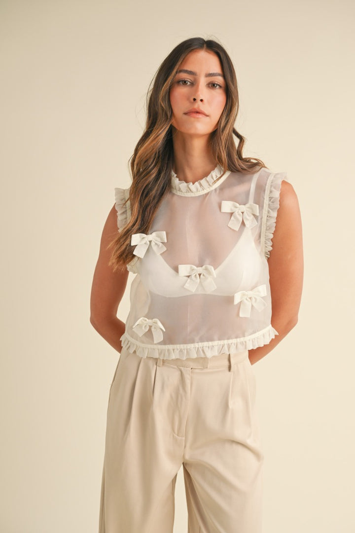 Sideline Seduction Sheer Bow Top